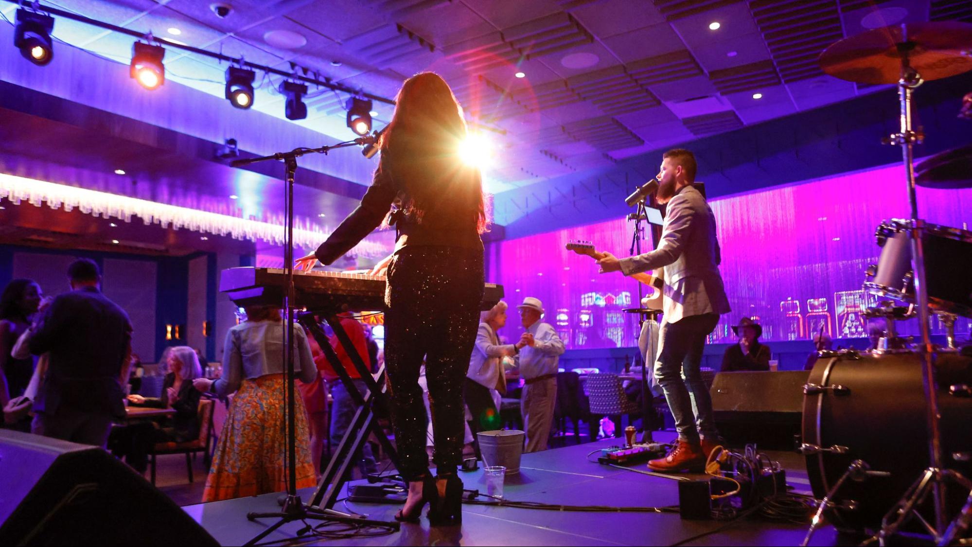 A band performs as guests dance at Pop's Lounge inside the Oaklawn casino
