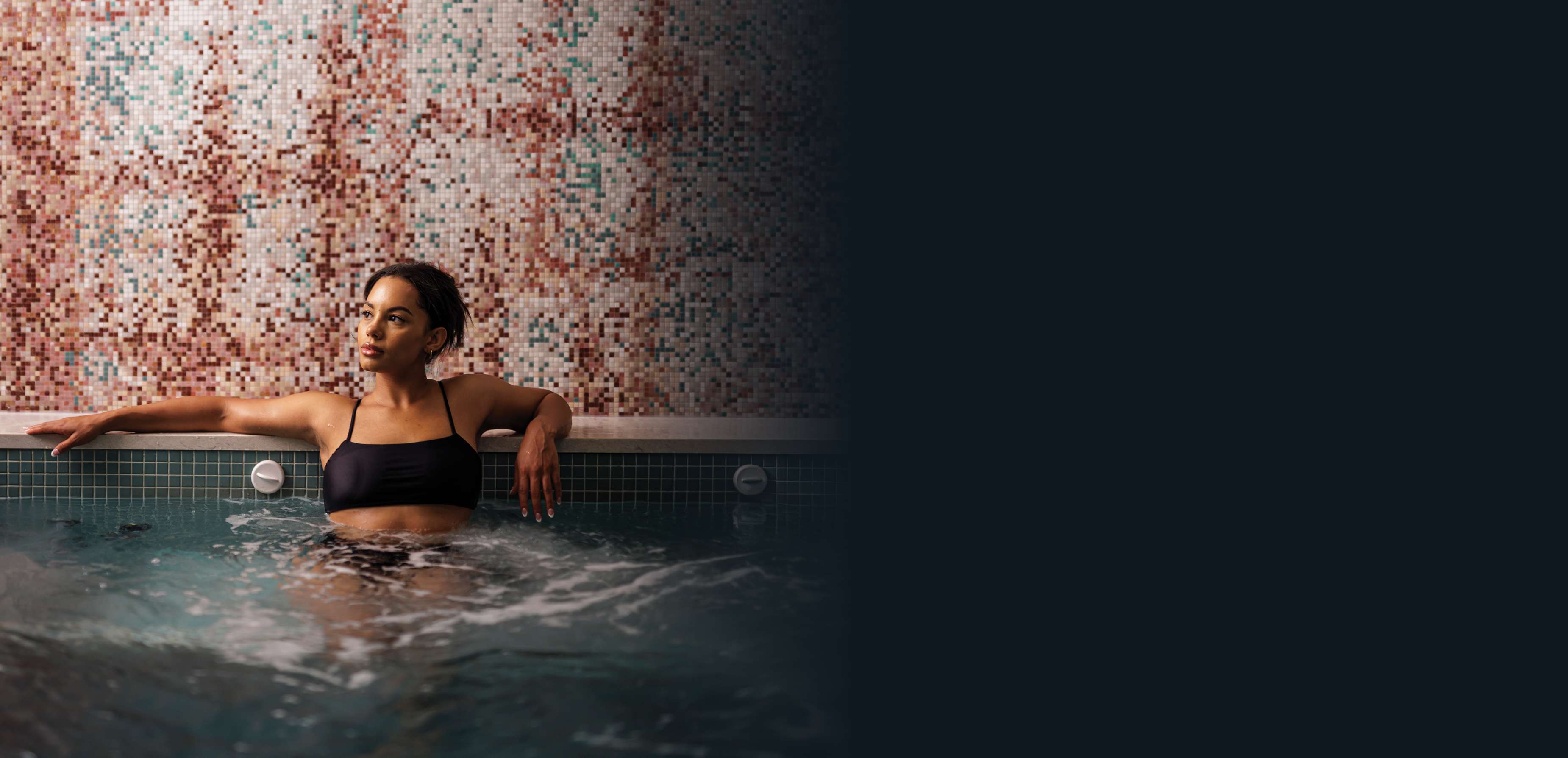 Woman enjoying amenities at Astral Spa